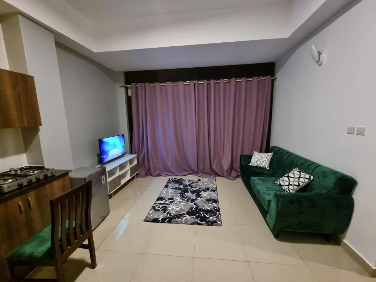 Eika Suites At Acacia Кампала Экстерьер фото