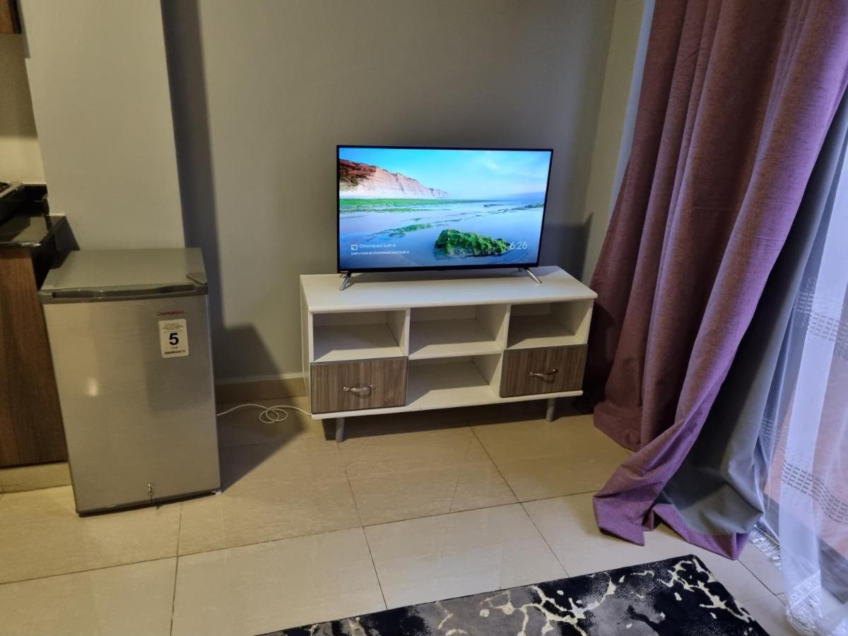 Eika Suites At Acacia Кампала Экстерьер фото